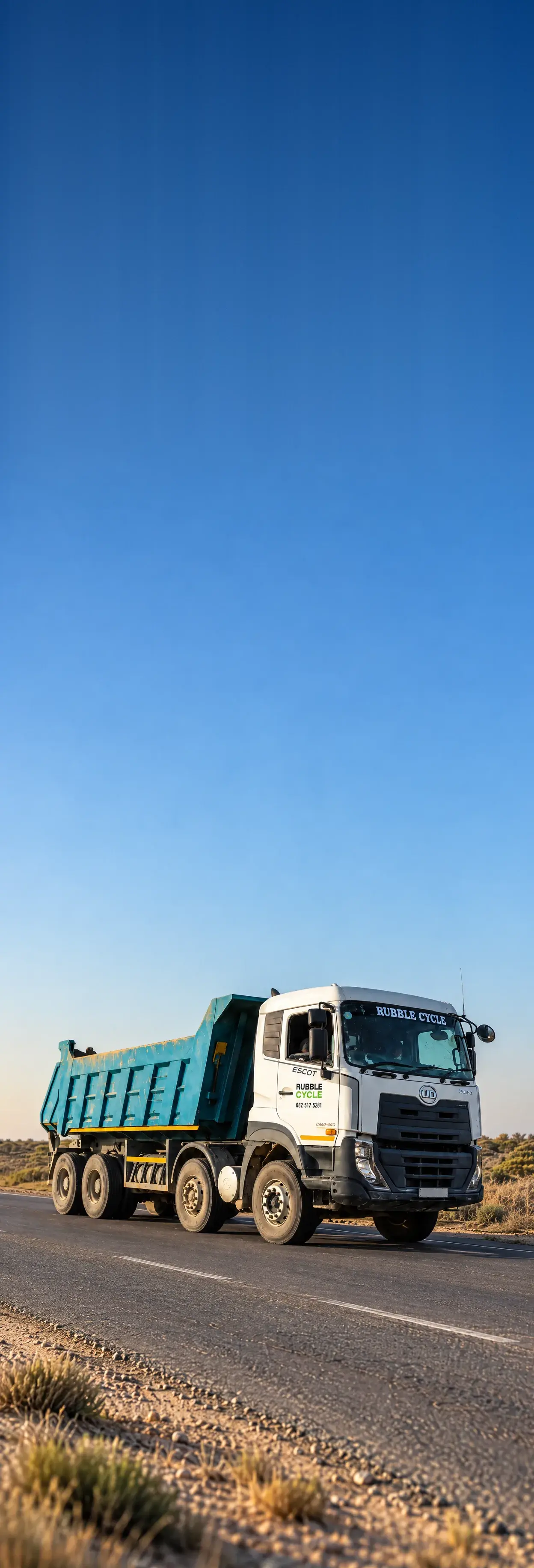 Rubble Cycle tipper truck on an open road on the Cape Flats